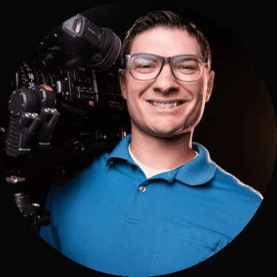 Adam Garceau with a cinema camera