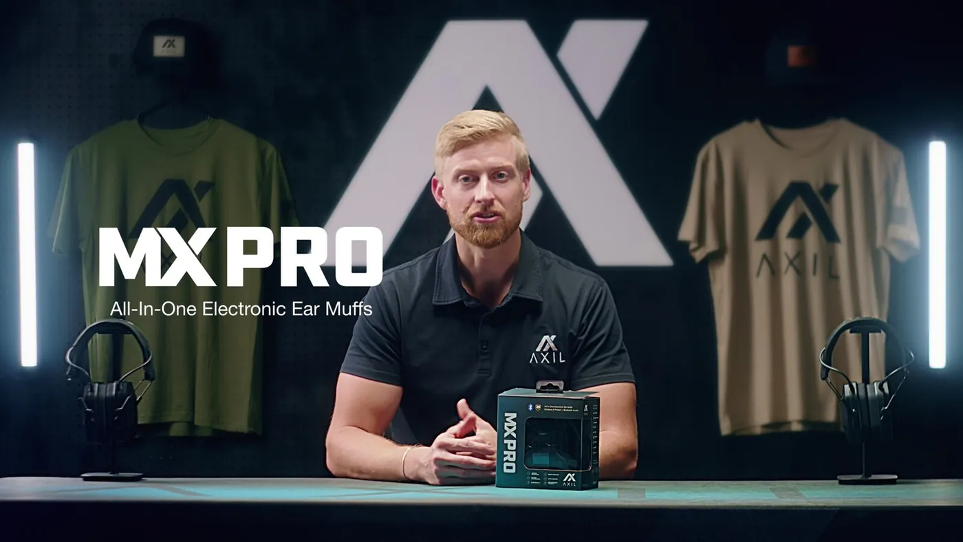A frame from the Axil product film, an outdoor audio product lit on a dark set.